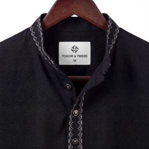 Jet black Pakistani-style Panjabi in premium self-textured jacquard fabric with elegant tonal embroidery on the band collar.